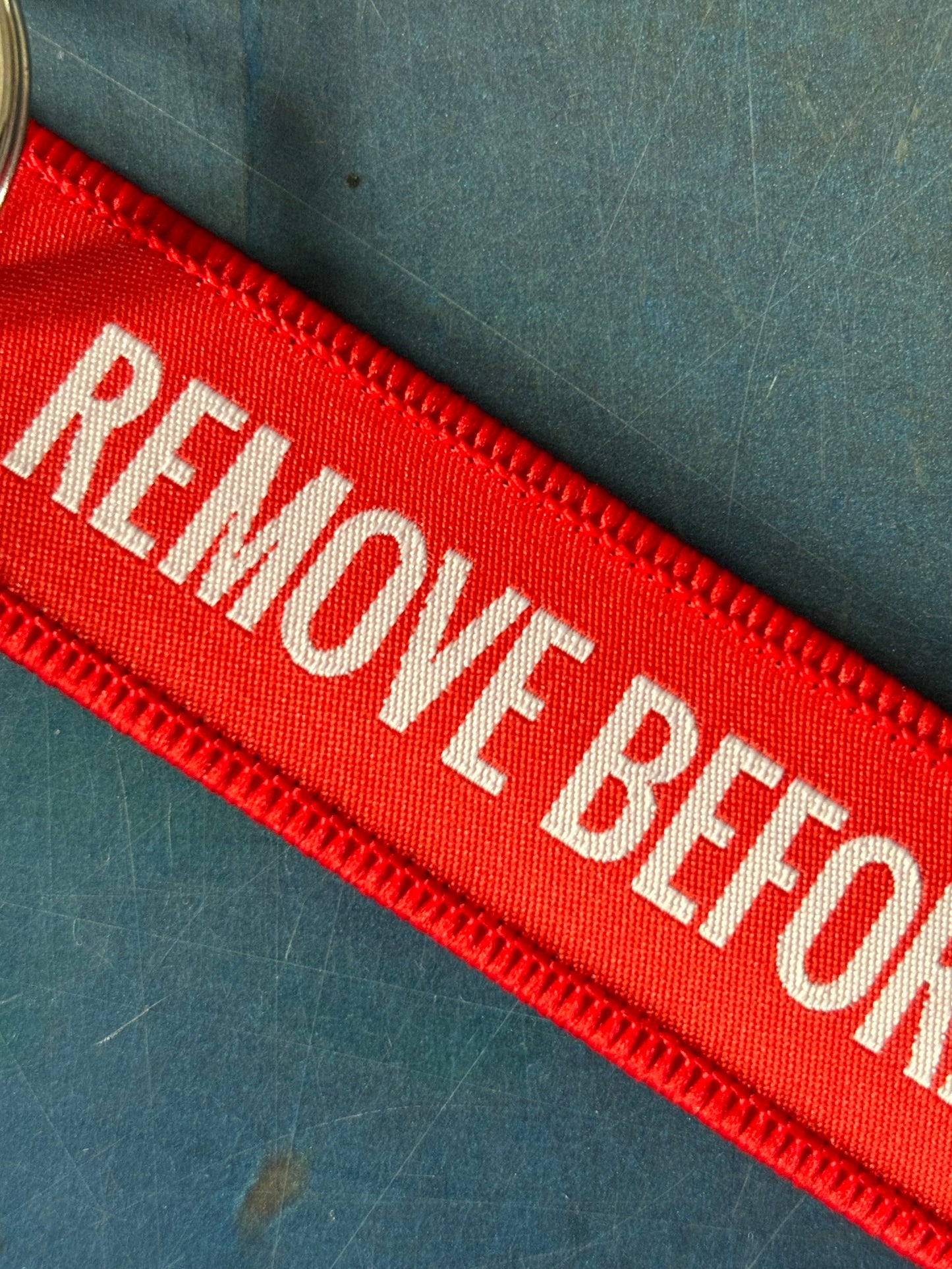 Schlüsselanhänger Remove before flight