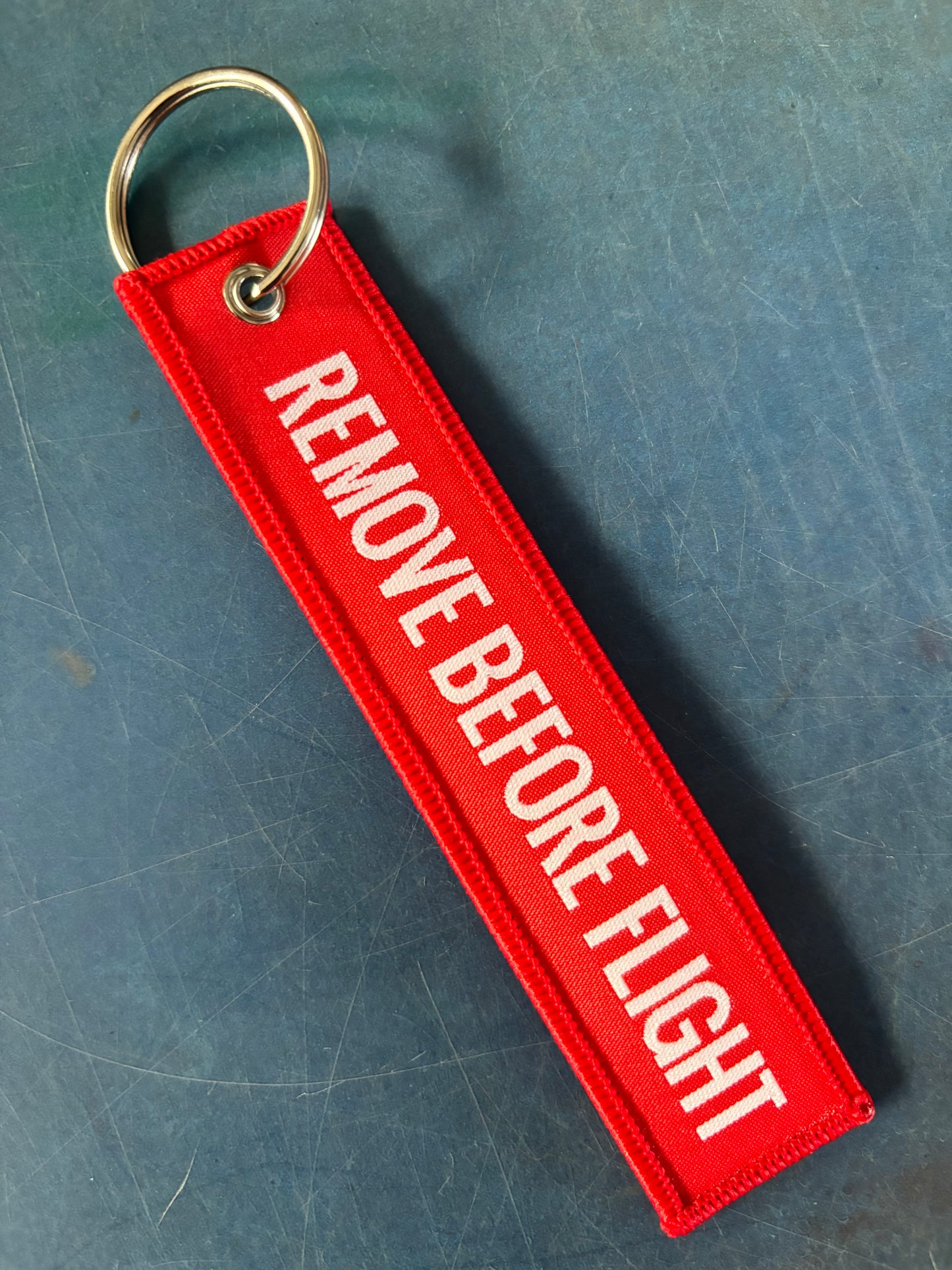 Schlüsselanhänger Remove before flight